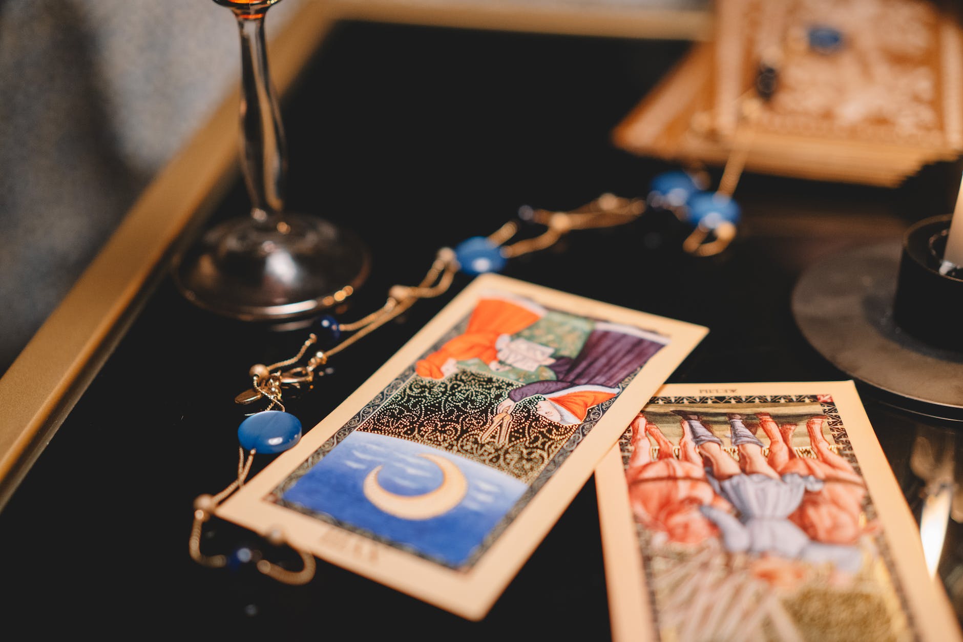 close up of tarot cards on a table